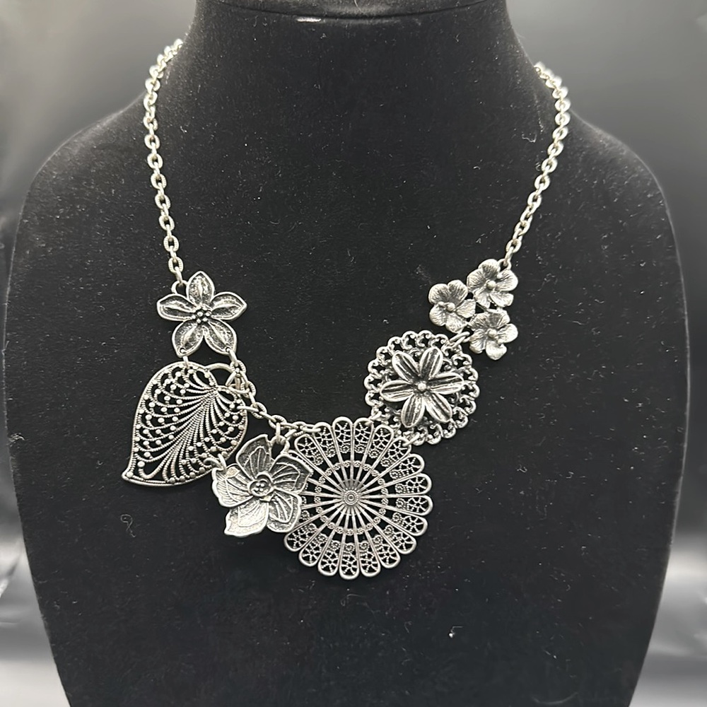 Possibly Premier Designs (can’t remember) silver necklace.